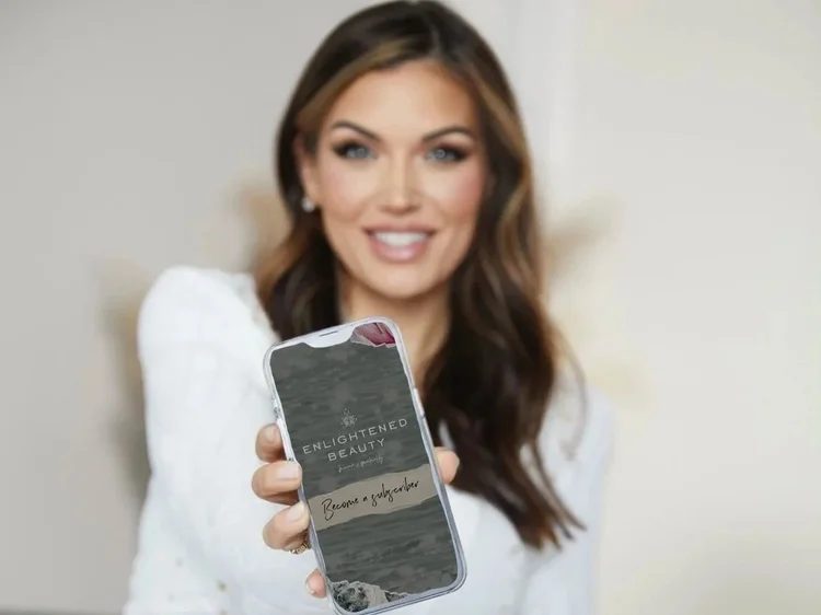 Esthetician holding a phone
